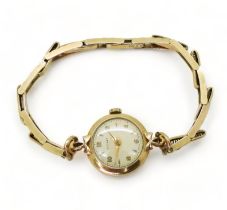A 9ct gold ladies Rotary watch and strap hallmarked London 1960, weight without mechanism 9gms