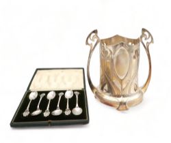 A WMF EPNS siphon bottle stand, and a set of white metal and enamel Arts and Crafts silver tae