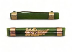 Two New Zealand jade bar brooches mounted with 9ct and yellow metal, length of the longest 5.3cm,
