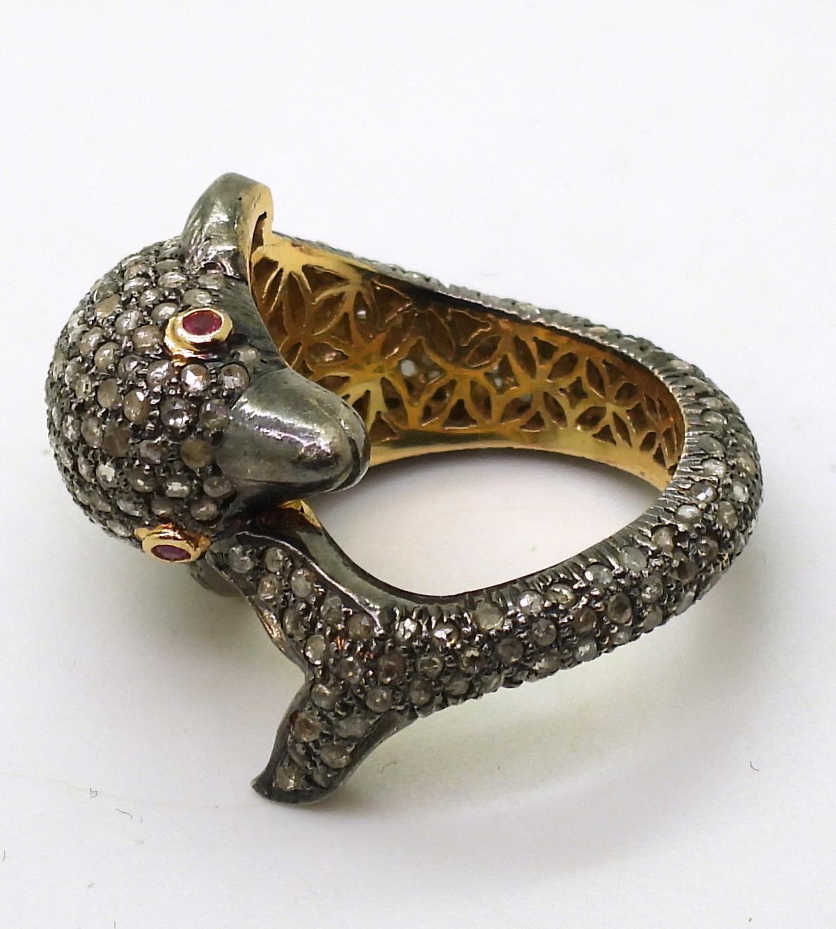 A yellow and white metal dolphin ring completely pave set with rose cut diamonds, with ruby set - Image 4 of 4