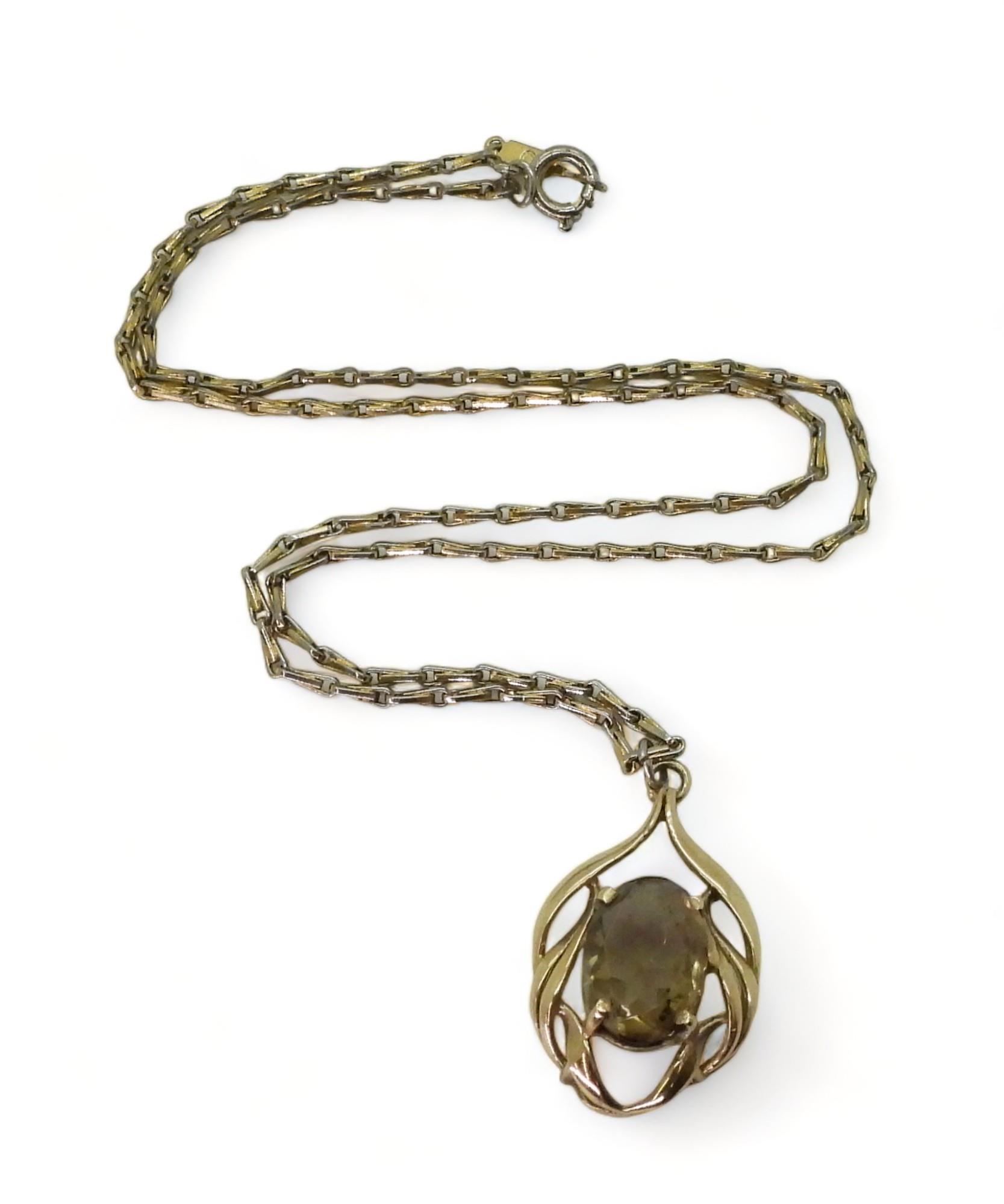 A 9ct gold smoky quartz pendant with a gold plated Monet chain, weight of the pendant approx 3.8gms, - Image 2 of 4