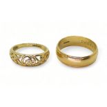 A 9ct gold wedding ring, size T1/2, and a Celtic knotwork ring, size O1/2, weight combined 7.1gms