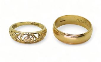 A 9ct gold wedding ring, size T1/2, and a Celtic knotwork ring, size O1/2, weight combined 7.1gms