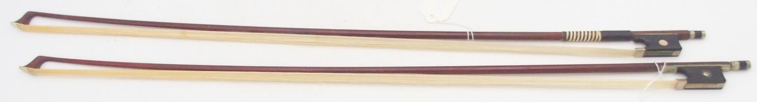 A violin bow 60 grams and another 61 grams Condition Report:Available upon request