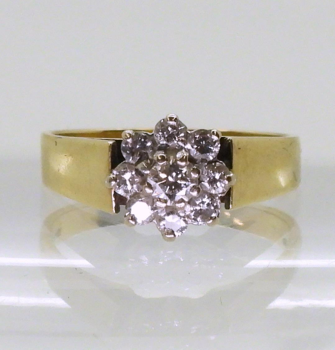 An 18ct gold diamond flower ring set with estimated approx 0.34cts, finger size M1/2, weight 3. - Image 2 of 3