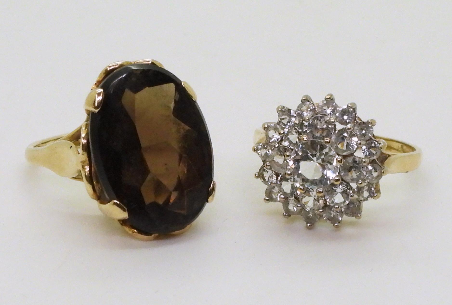 A 9ct gold smoky quartz ring, hallmarked London 1963, size K, and a clear gem set cluster, size O, - Image 2 of 3