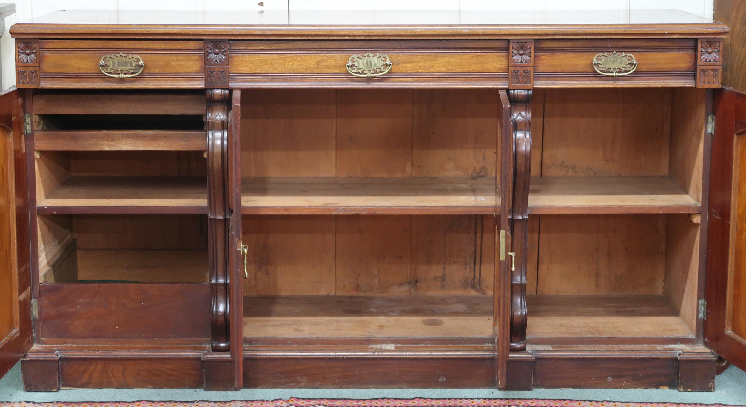 A late Victorian mahogany sideboard with four short drawers over four cabinet doors, 98cm high x - Image 3 of 3