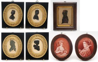 A 19th century silhouette portrait miniature of a lady in profile, housed in a rosewood frame,