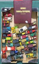 A collection of Matchbox Models of Yesteryear die-cast model vehicles, with an accompanying