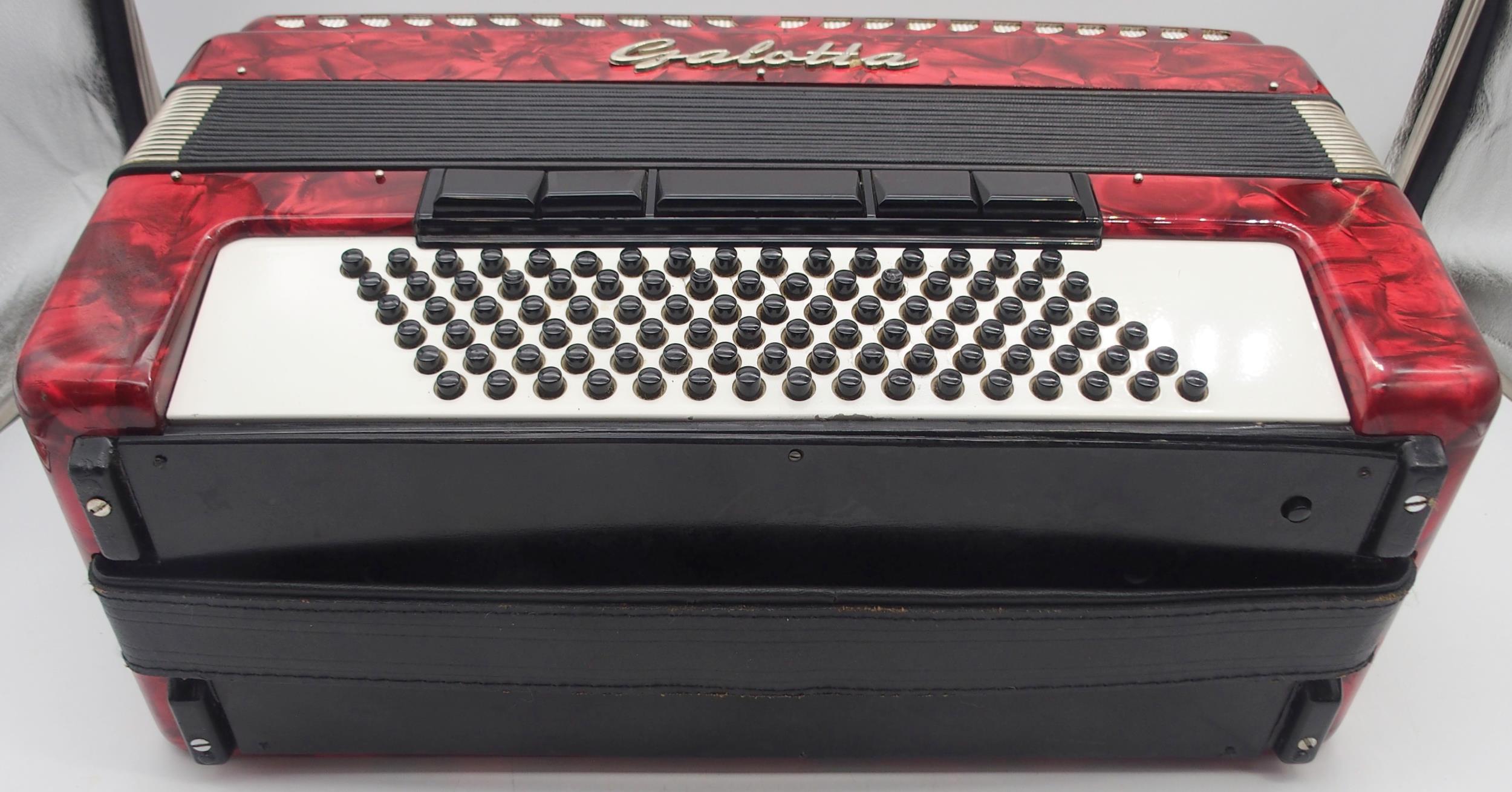 A Galotta IV voice 96 bass 37 key piano accordion in red with a fitted case Condition Report: - Image 3 of 7
