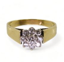 An 18ct gold diamond flower ring set with estimated approx 0.34cts, finger size M1/2, weight 3.