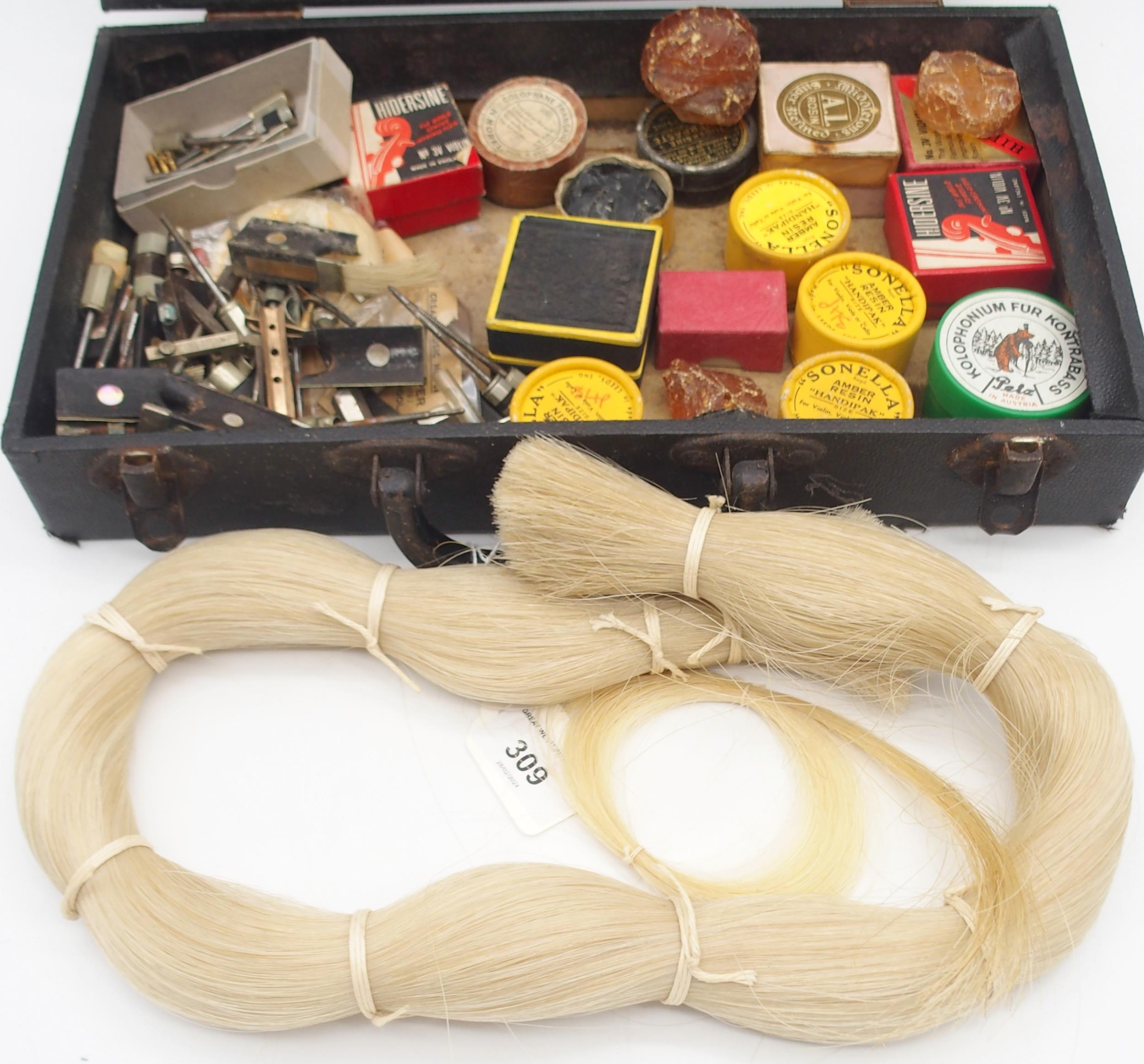 A bow maker's hank of horse hair approximately 84 cm in length and 440 grams together with various