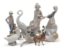 A collection of Lladro and Nao figures including animals and birds and other figures  Condition