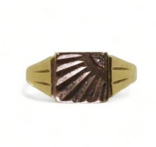 A 9ct gold sunburst pattern signet ring, set with a diamond, hallmarked Birmingham 1963, finger size
