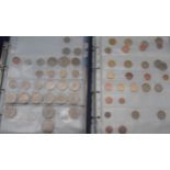 A collection of worldwide coins an album Condition Report:Available upon request