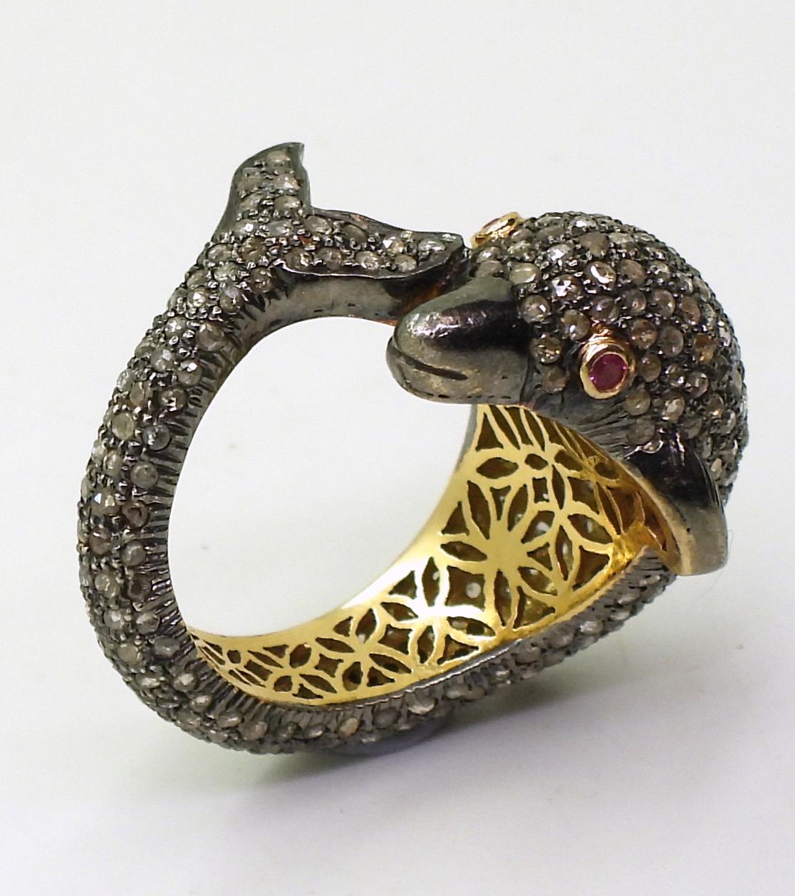 A yellow and white metal dolphin ring completely pave set with rose cut diamonds, with ruby set - Image 3 of 4