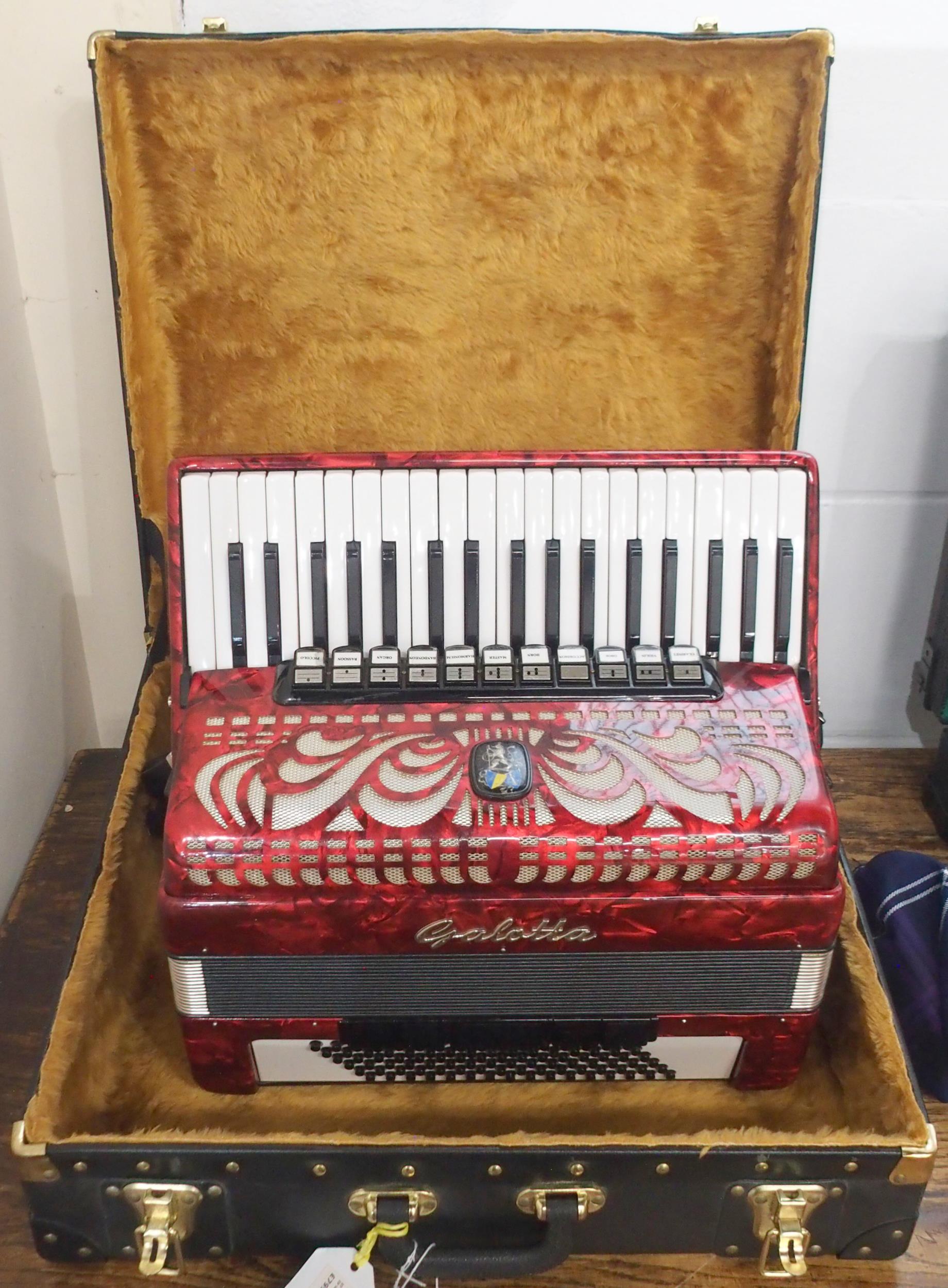 A Galotta IV voice 96 bass 37 key piano accordion in red with a fitted case Condition Report: - Image 7 of 7