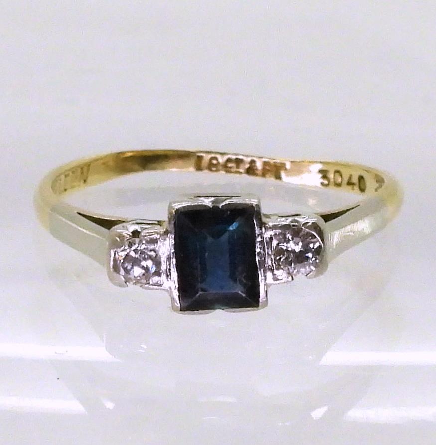 An 18ct and platinum sapphire and diamond ring set with a square cut sapphire of approx 5mm x 4mm - Image 2 of 3