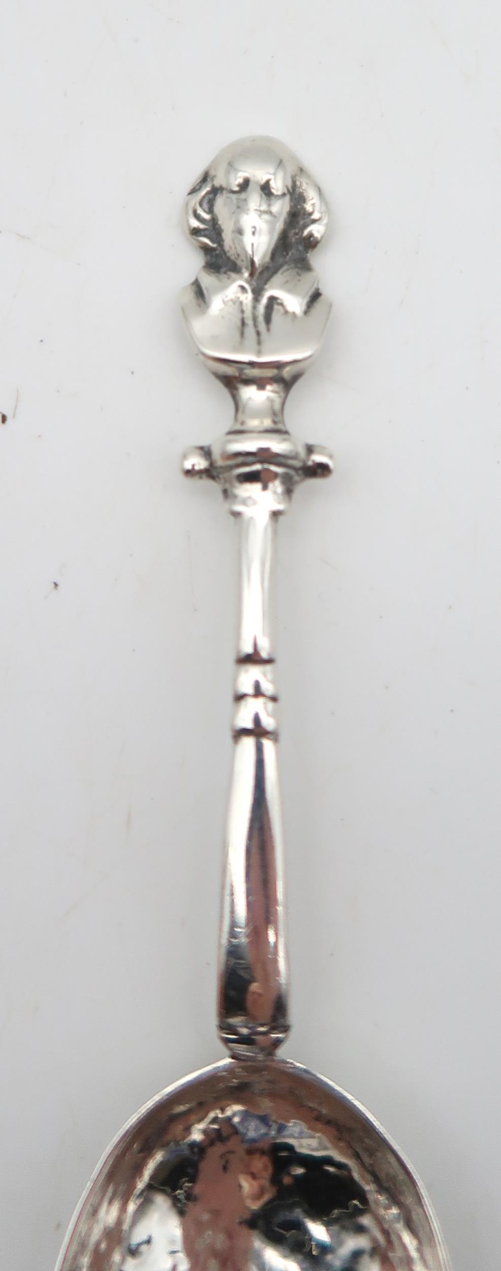 An Arts and Crafts silver spoon, by Winifred King & Co, Birmingham 1927, with a hammered and pointed - Image 2 of 4