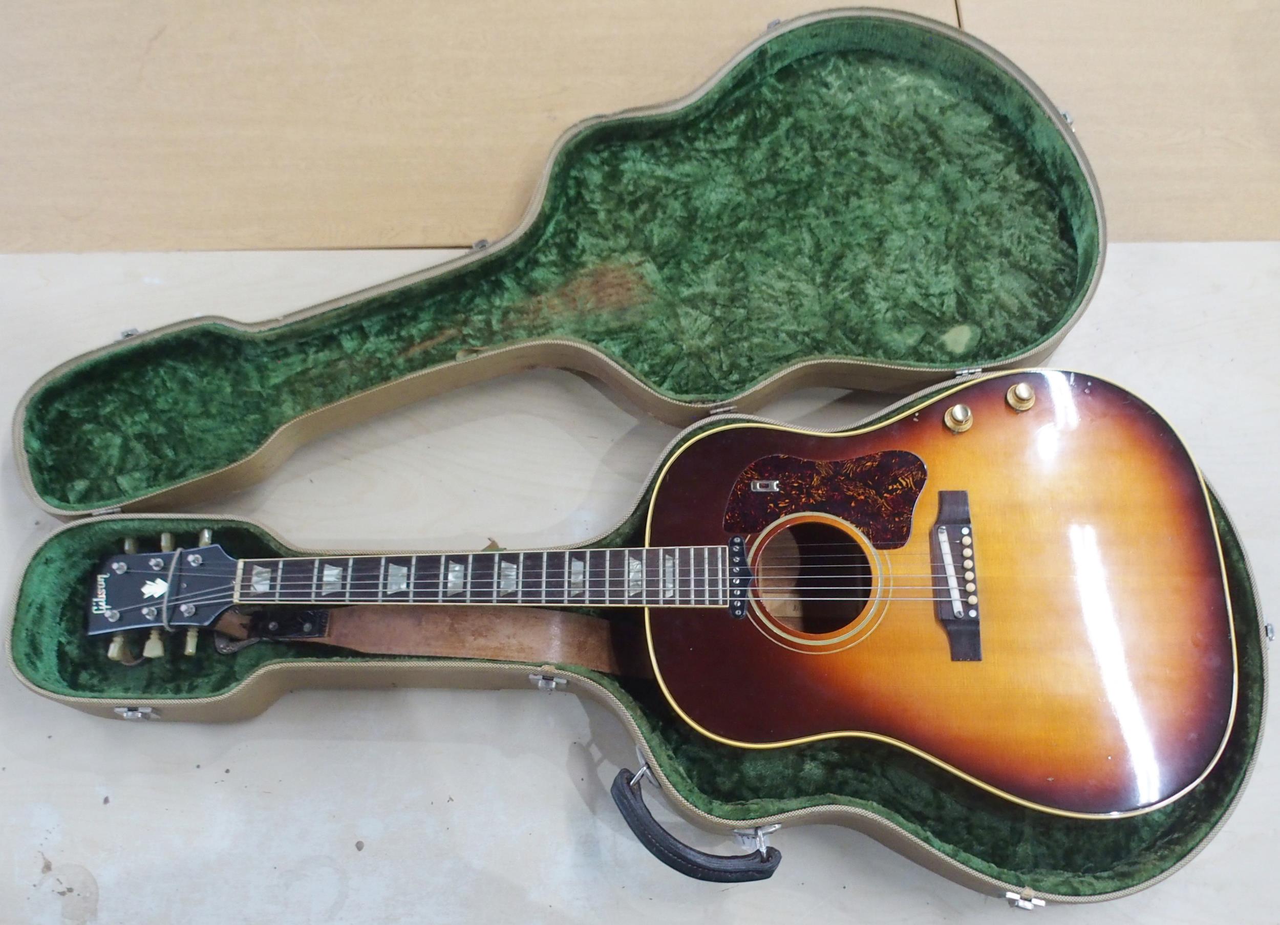 GIBSON a Gibson J160E electro acoustic guitar in dark sunburst serial number 890922 circa 1969 - Image 2 of 39