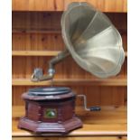 An early 20th century "His Masters Voice" winding gramophone with brass horn on octagonal base