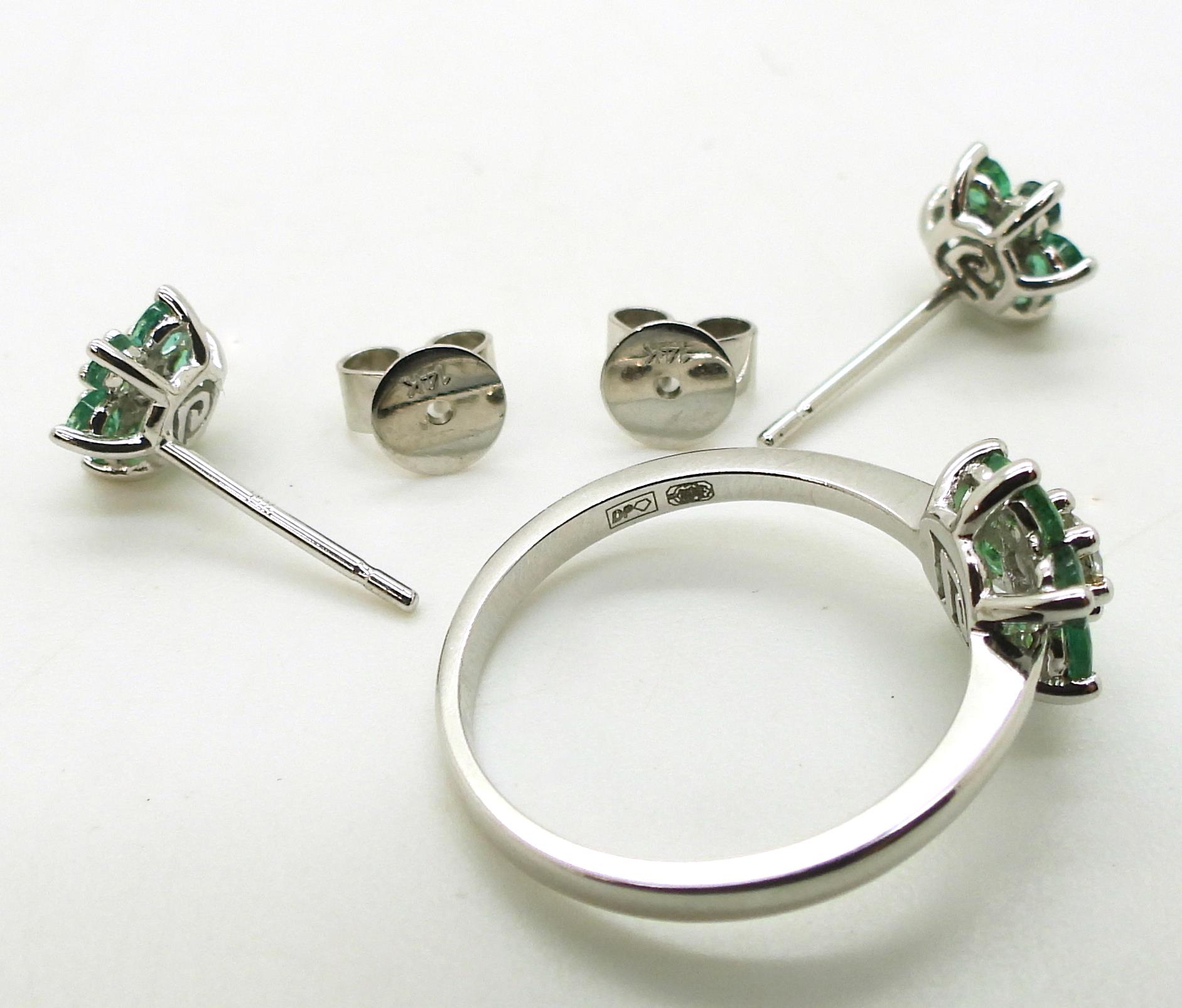 A 14k white gold emerald and diamond flower ring, size O, with matching earrings, set with estimated - Image 3 of 3