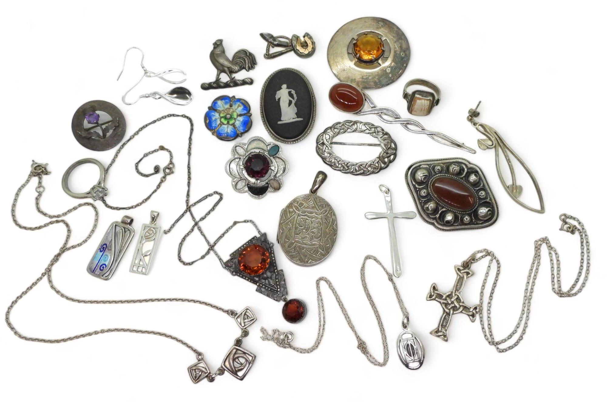 A collection of silver and costume jewellery to include, a citrine and marcasite pendant, an Ortak