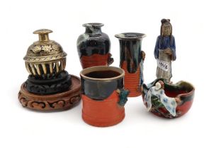 A small group of Sumida Gawa pottery, together with an elephant bell, two stands and a figure