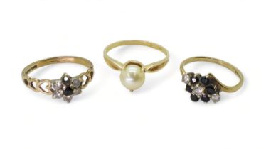 A yellow metal pearl set ring, size O, together with two 9ct gold sapphire and clear gem set