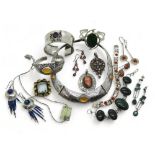 A collection of gem set silver jewellery to include an amber torc style necklace and similar