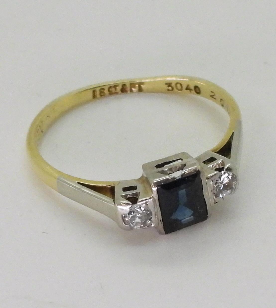 An 18ct and platinum sapphire and diamond ring set with a square cut sapphire of approx 5mm x 4mm - Image 3 of 3