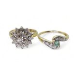 A 9ct gold emerald and diamond ring, set with estimated approx 0.10cts of brilliant cut diamonds and