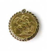 An 1889 gold full sovereign in a 9ct gold pendant mount, weigh together 8.8gms Condition Report: