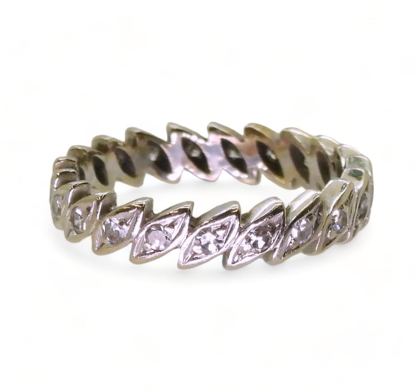 An unusual French 18ct gold, leaf design full eternity ring set with estimated approx 0.40cts of