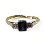 An 18ct and platinum sapphire and diamond ring set with a square cut sapphire of approx 5mm x 4mm