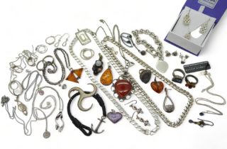 Two silver curb chains, 44cm x 0.7cm, 48cm x 0.7cm, a silver Tom Hope anchor bracelet, amber