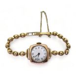 A 9ct gold ladies Swiss made vintage watch and decorative bobble strap, weight including mechanism