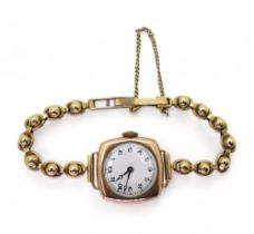 A 9ct gold ladies Swiss made vintage watch and decorative bobble strap, weight including mechanism