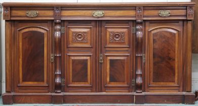 A late Victorian mahogany sideboard with four short drawers over four cabinet doors, 98cm high x