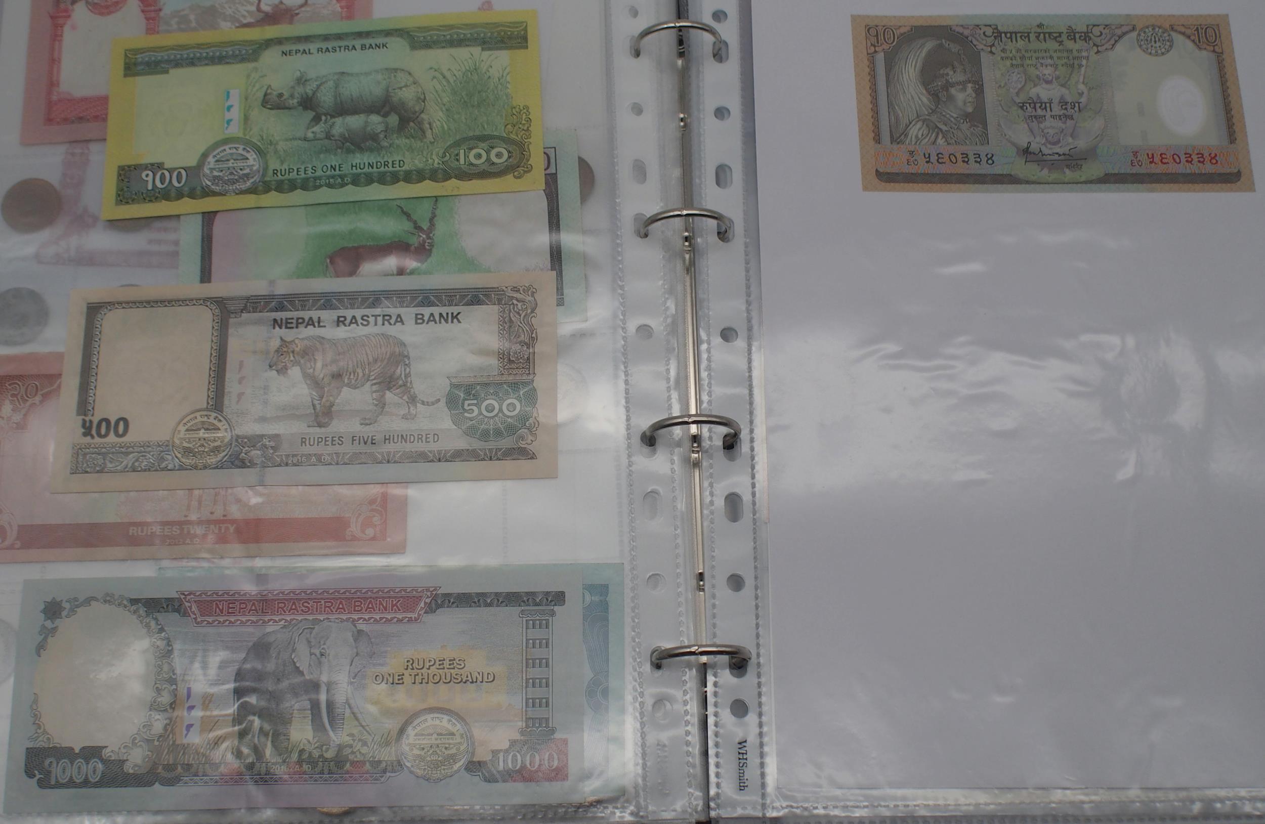 A collection of worldwide banknotes with examples from North Korea, Iraq, Syria, The Islamic - Image 9 of 11