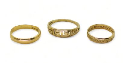 An 18ct gold wedding ring, size Q1/2, weight 2.9gms, together with a 9ct gold wedding ring size N1/