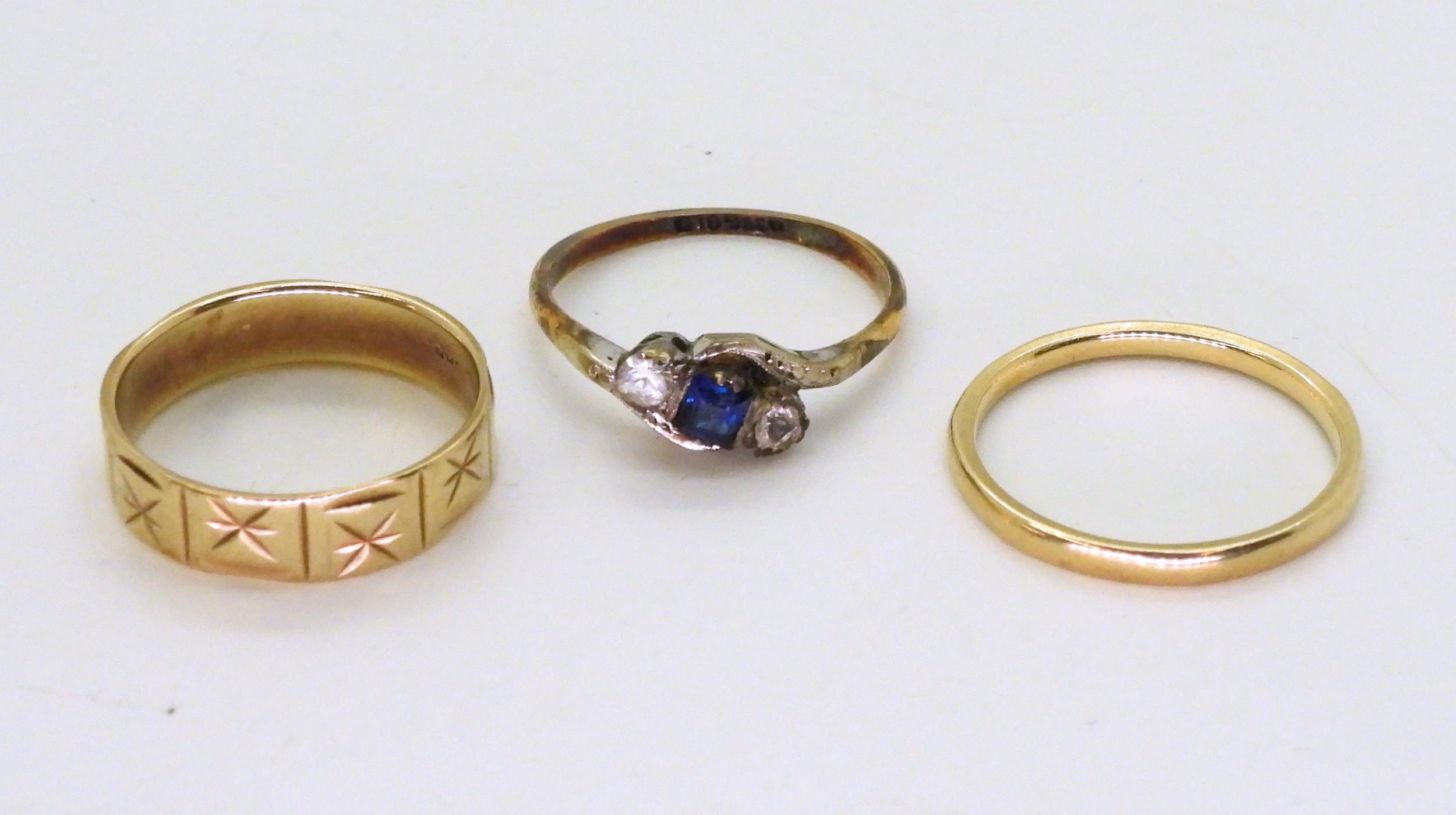 A 9ct gold wedding ring with engraved star pattern, size M1/2, a wedding band, size O, and a blue - Image 2 of 2
