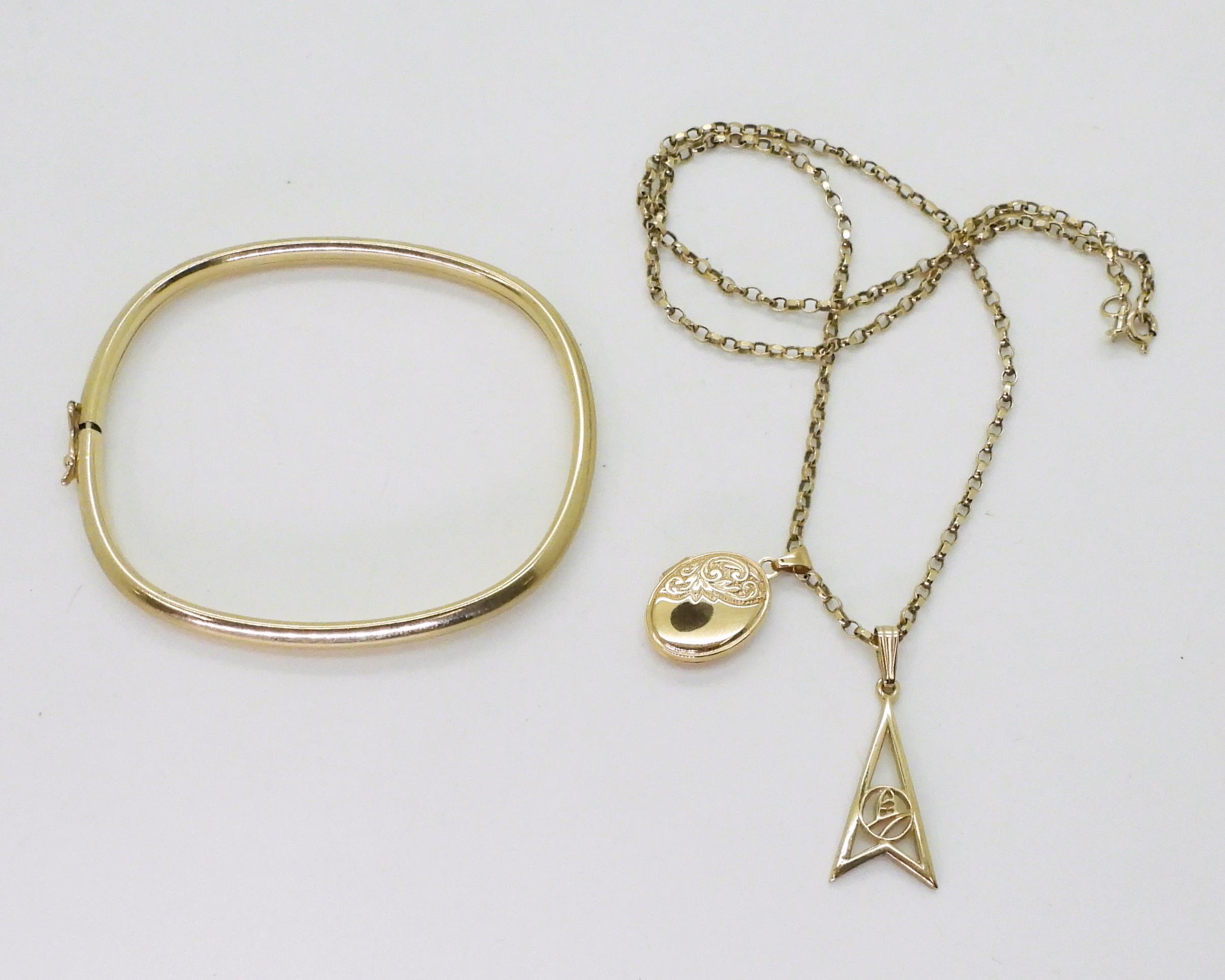 A 9ct gold bangle, chain and two pendants, weight together 13.9gms Condition Report:Available upon - Image 2 of 2