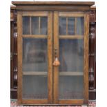 A 20th century oak two door glazed bookcase, 100cm high x 79cm wide x 26cm deep Condition Report: