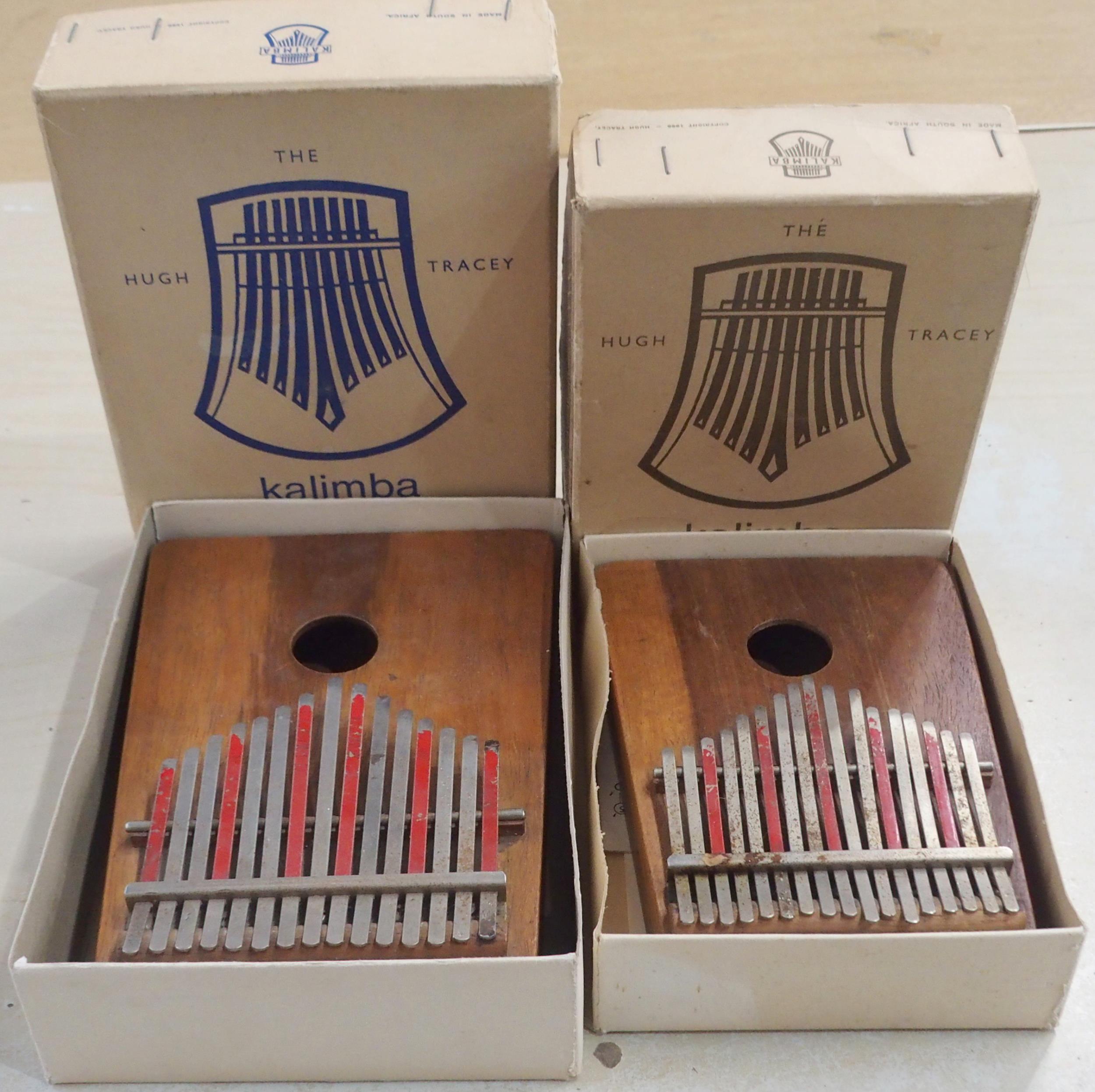 A lot comprising an alto Kalimba together with a treble Kalimba by Hugh Tracey South Africa circa