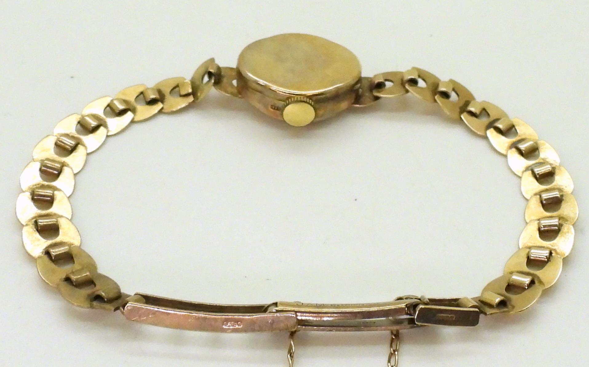A 9ct gold ladies Majex watch and strap, weight including mechanism 11.6gms Condition Report: - Image 2 of 2