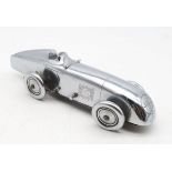 A chrome-plated Art Deco MG "Magic Midget" table lighter, marked to the underside "S&M, Made in