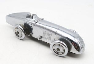 A chrome-plated Art Deco MG "Magic Midget" table lighter, marked to the underside "S&M, Made in
