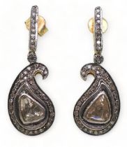 A pair of yellow and white metal paisley shaped polki and brilliant cut diamond earrings, length