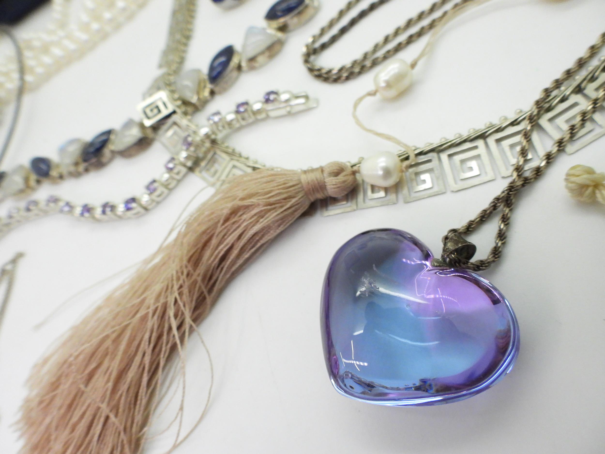 A signed Baccarat purple heart pendant, a silver moonstone and iolite bracelet, Mexican silver Sun - Image 5 of 6